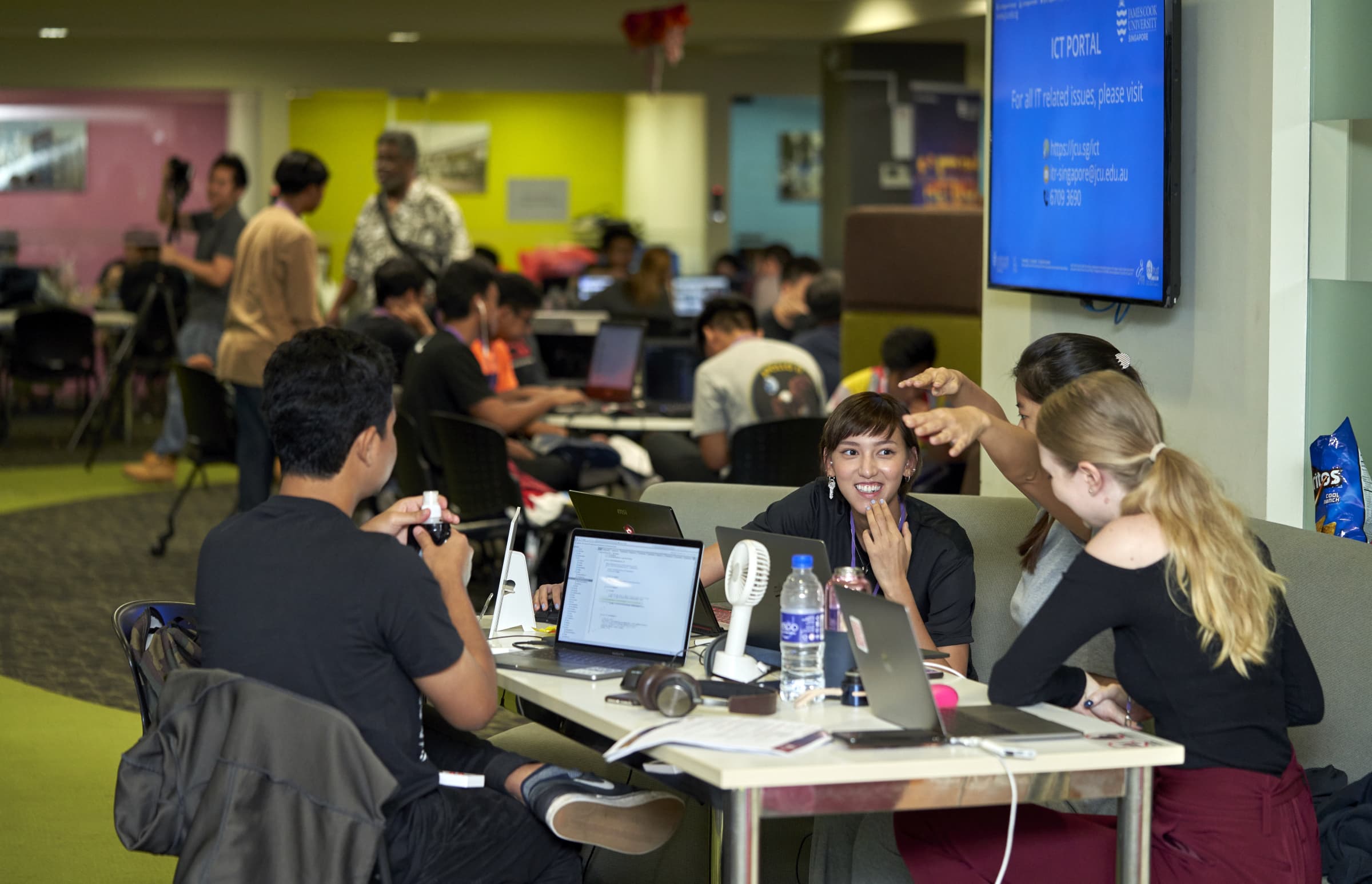 Students collaborating on a hardware/software project